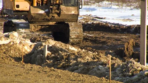 Not a large excavator at the construction site. The worker controls the machine Stock Footage 94486900