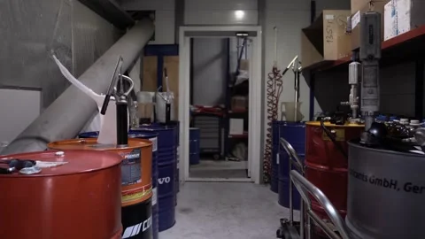 Not a large warehouse with full colored barrels of fuel, gasoline, oil, diesel Stock Footage 261286918