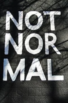 Not normal sign painted on the wall Stock Photos