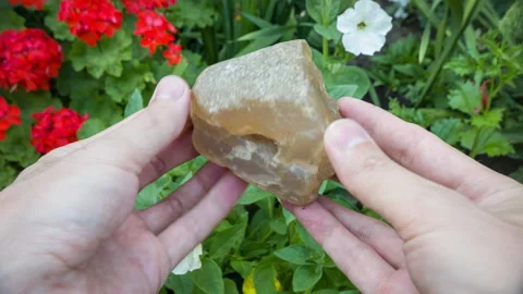 Not polished Agate specimen with a Quartz crystal center. Stock Footage 116694795