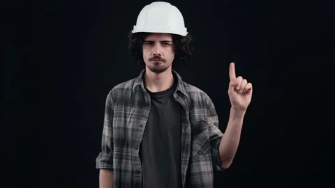 That..is not possible. The engineer with the white helmet looks seriously and Stock Footage 156278463