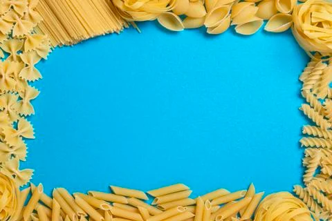 Not prepared a dry paste of different species on a blue background in various Foto stock