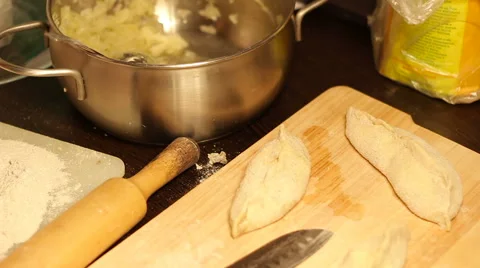 Not ready home baking is on the cutting board. Stock Footage 57340924