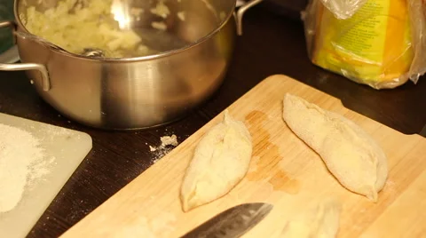 Not ready home baking is on the cutting board. 스톡 동영상 57341262