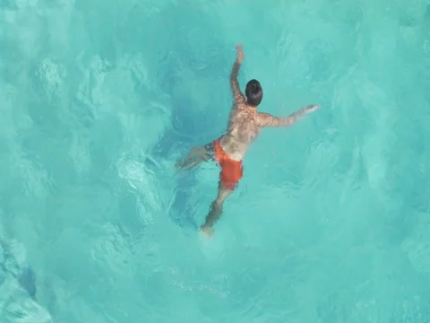 Not recognisable man in the swimming pool Stock Footage 80342356