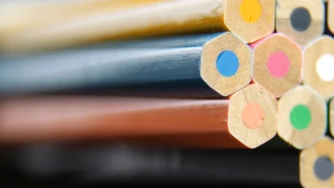 Not sharpened colored pencils on gray background Stock Footage 89070164
