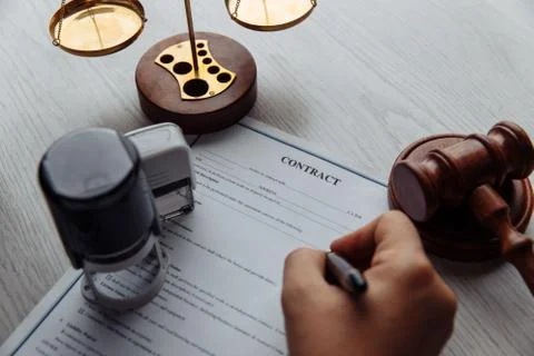 Notary man approves the document close-up. Notary public tools Stock Photos