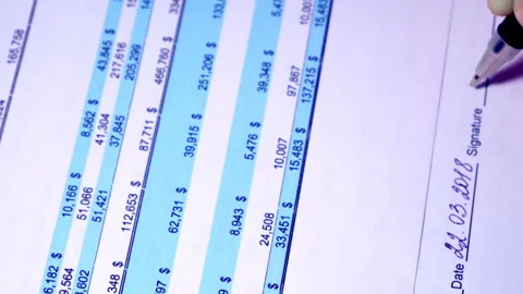 The notary signs the document. For a long time trying. Doubt. Stock Footage 87573590
