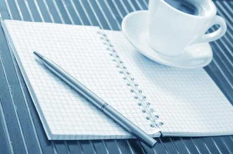 Note and pen Stock Photos