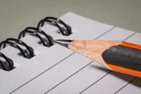 Note and pen Stock Photos