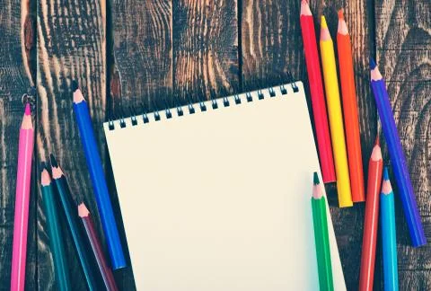 Note and pencils Stock Photos