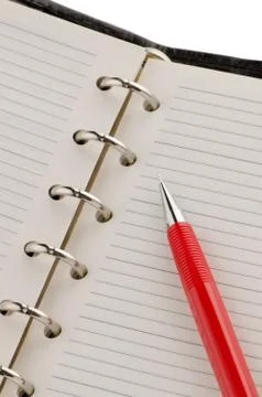 Note book and pencil Stock Photos