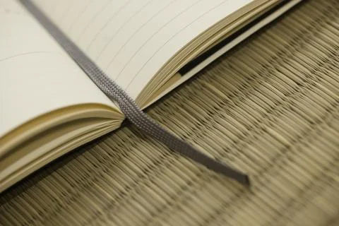Note book with fabric bookmark. Stock Photos