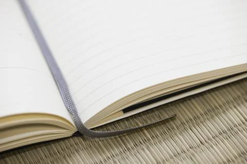 Note book with fabric bookmark. Stock Photos