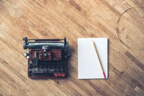 Note book with typewriter Stock Photos