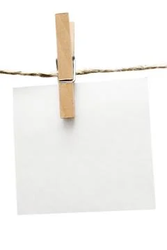 Note on Clothespin Isolated on a White Background Photos