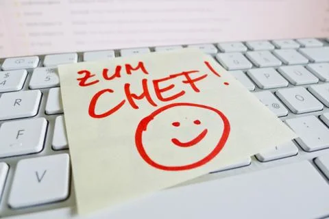 Note on computer keyboard: go to boss Stock Photos