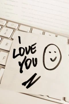 Note on computer keyboard: i love you Stock Photos
