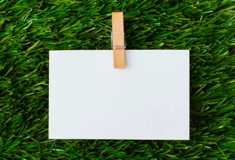 Note in green grass Stock Photos