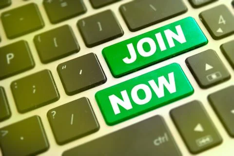 Note JOIN NOW writting on green button on computer keyboard Stock Photos