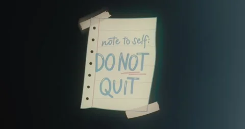 Note with motivational message DO NOT QUIT Stock Footage 314504547