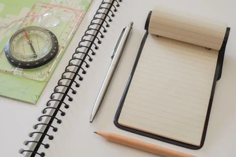 Note Pad with Map and Compass Stock Photos