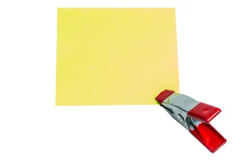 Note paper and macro clip red color isolated on white background Stock Photos