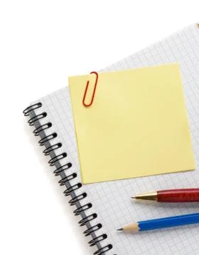 Note paper and notebook on white Foto stock