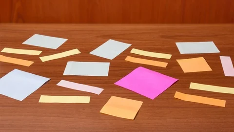 Note paper appears on the table in stop motion Stock Footage 120251827