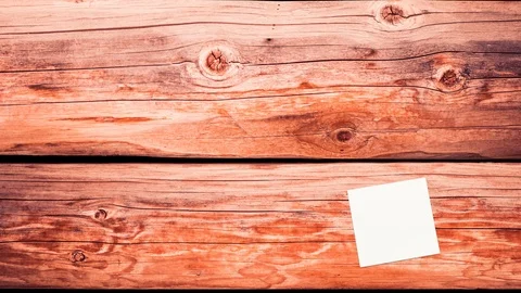 Note paper falling on moving wood planks Stock Footage 113680328