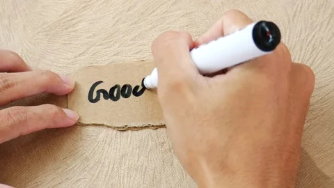 Note paper in hand holds paper with a question mark Stock Footage 268912393