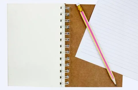 Note paper with pencil on notebook Stock Photos