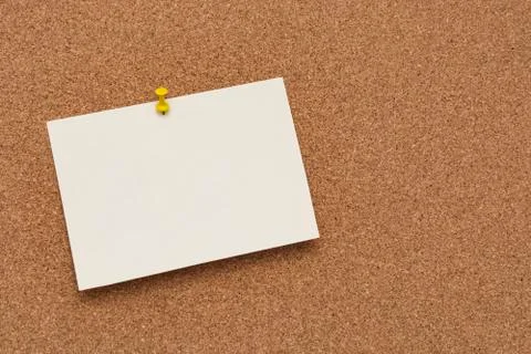 Note paper swith push pins on cork board. Empty paper pages for notes copy sp Stock-Fotos