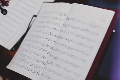 Note papers on music note stand Stock Photos