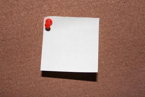 Note pinned on board Stock Photos
