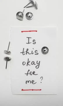 Note with question and thumbtacks on white background for office use Stock Photos