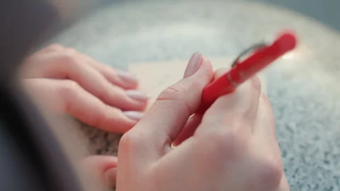 Note on smooth granite surface. Casual moment captured on cafe countertop Stock Footage 332618134