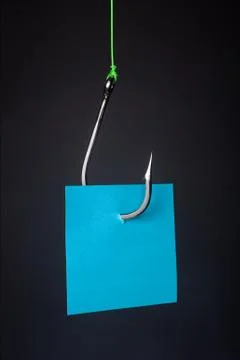 Note snagged on fishook Stock Photos