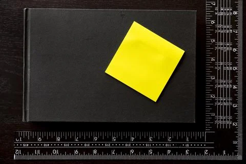 Note sticker, note book and carpenter's square Stock Photos