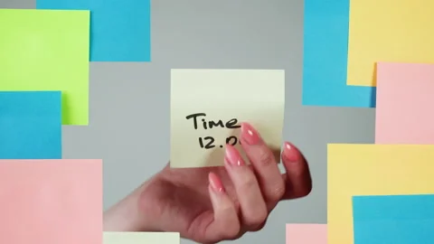 Note sticker on transparent glass close-up. Working in office, creative designer Stock Footage 182010912