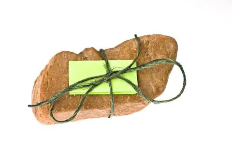 Note tied to rock Stock Photos