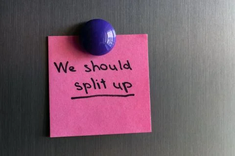 Note we should split up with a magnet attached to the refrigerator. Stock Photos