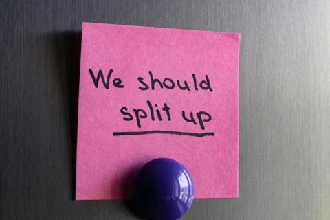 Note we should split up with a magnet attached to the refrigerator. Stock Photos