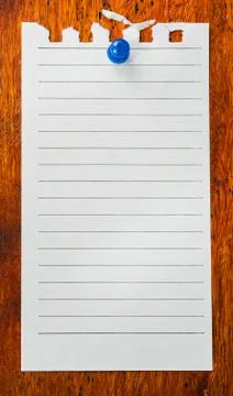 Note on wooden background Stock Photos