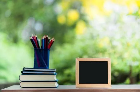 Notebook and blackboard Stock-Fotos