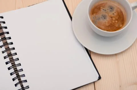 Notebook and coffee Stock Photos