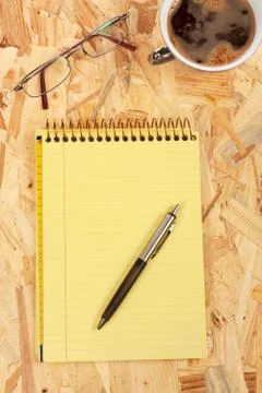 Notebook and coffee Stock Photos