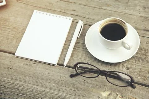 Notebook and coffee Stock Photos