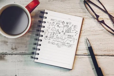 Notebook and coffee Stock Photos