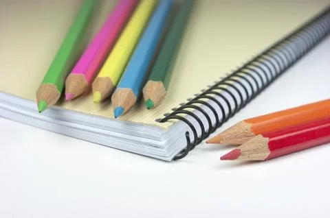 Notebook and crayons, back to school Stock Photos